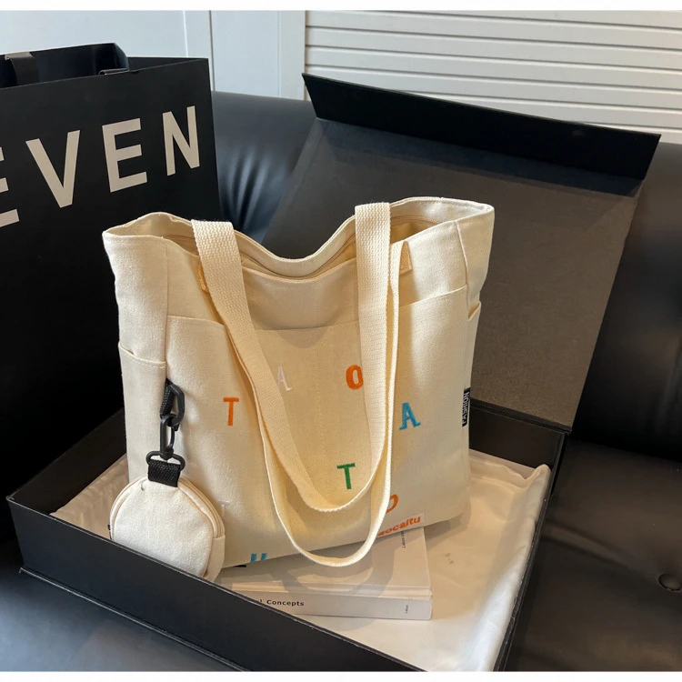 大容量帆布包包女2025新款通勤托特包女大学生上课单肩包手提包