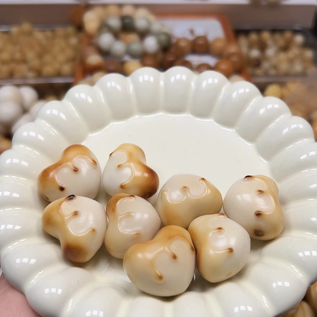 手串菩提根/象牙果瑕疵炭烤m爱心8颗左右孔有裂