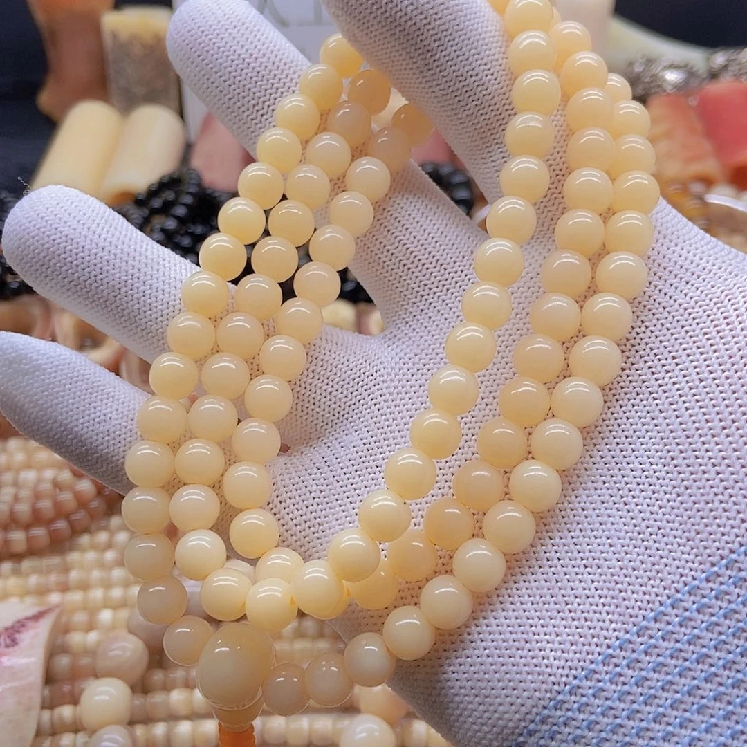驼骨手串/手链8毫米黄透圆珠108