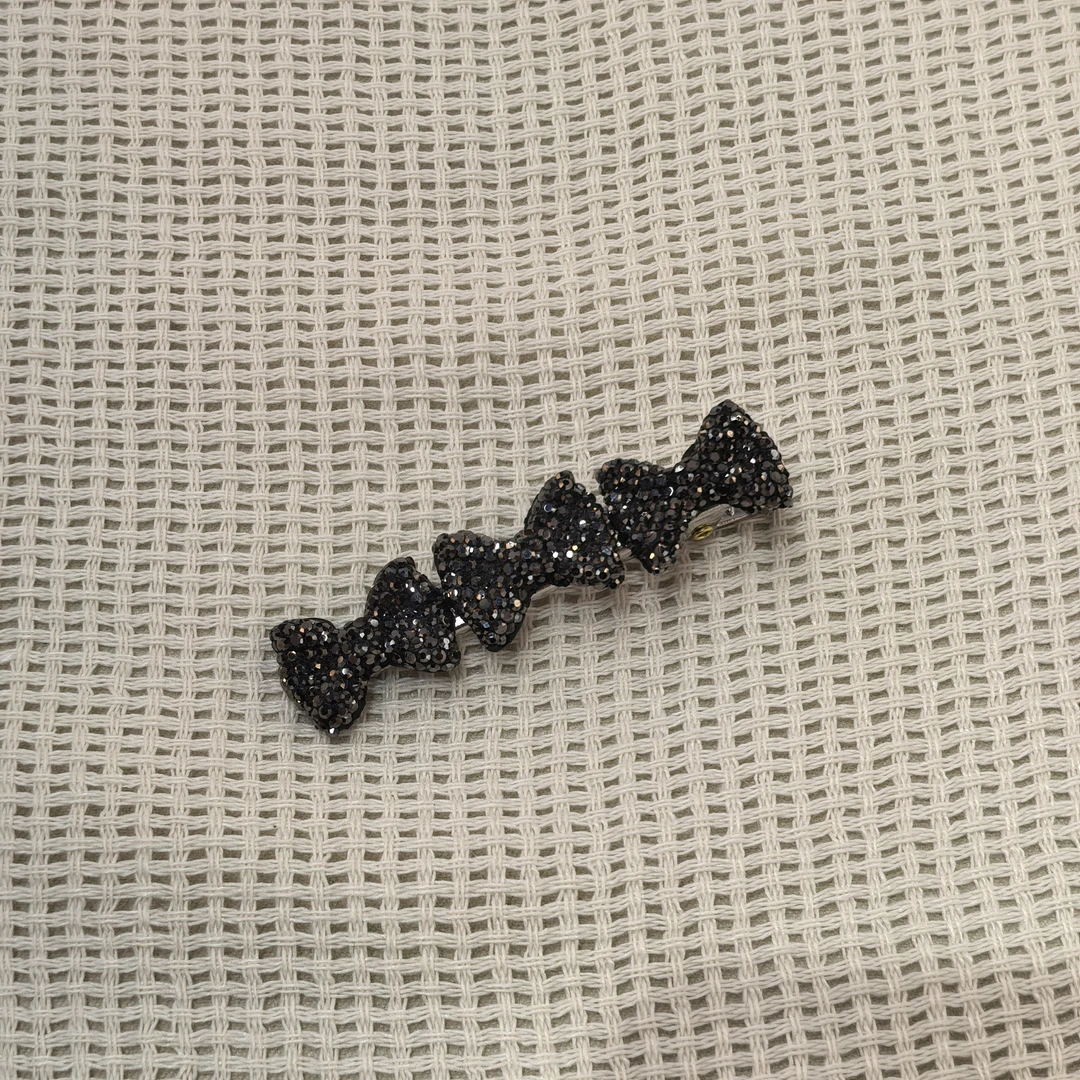 A710黑枪色三个蝴蝶结闪闪边夹
