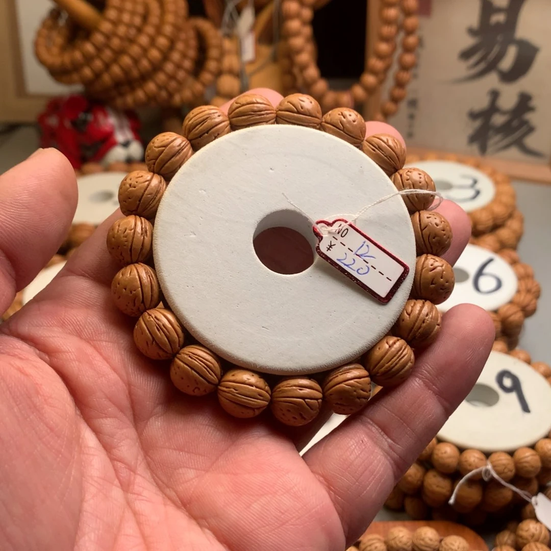 山****桃核手串1.2金蝉子小桃核手串