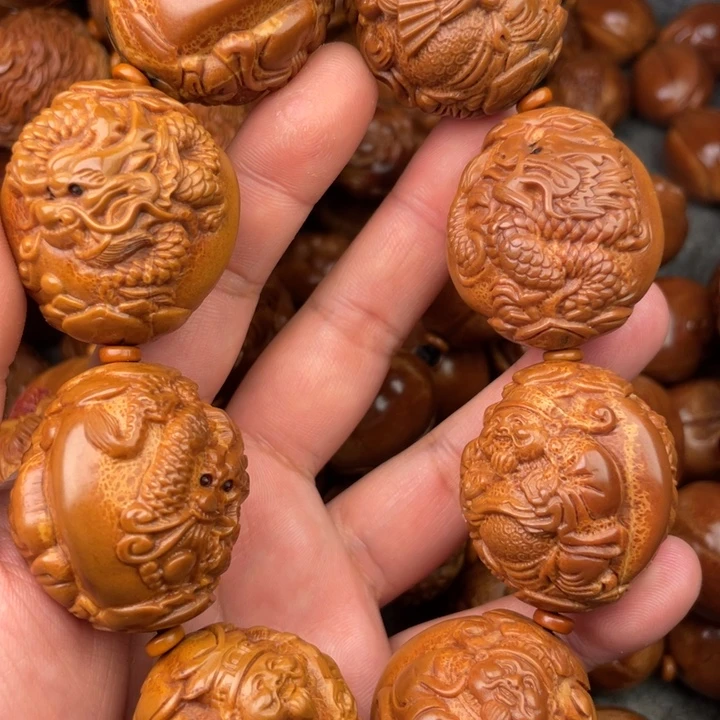 橄榄核手串幸**着橄榄核手持