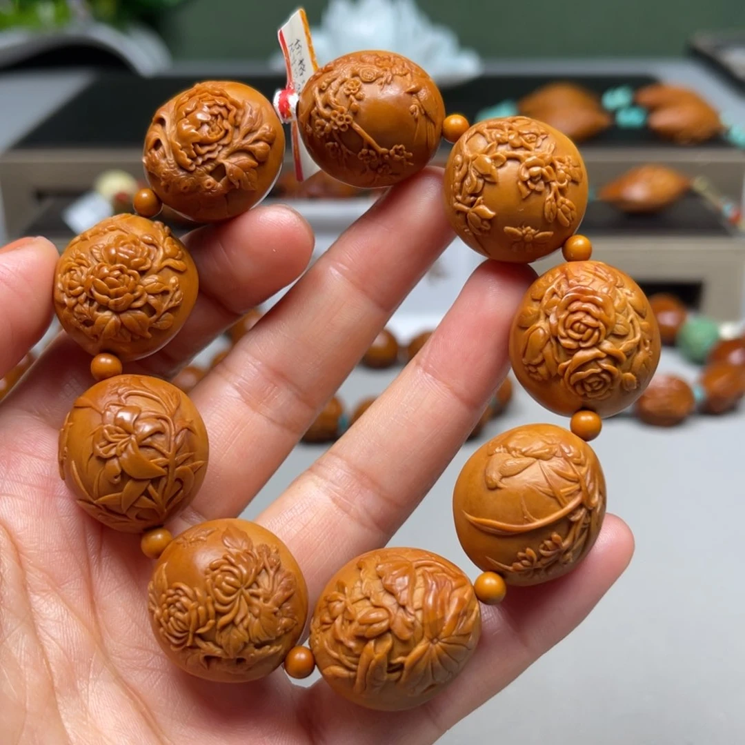 吊坠橄榄核百花齐放手串