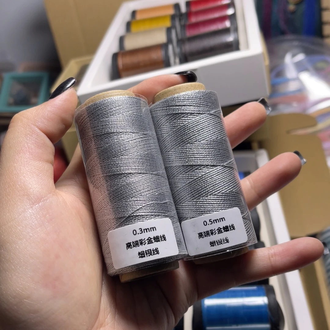 腈纶0.3+0.5高端彩金蜡线纸轴银色各一