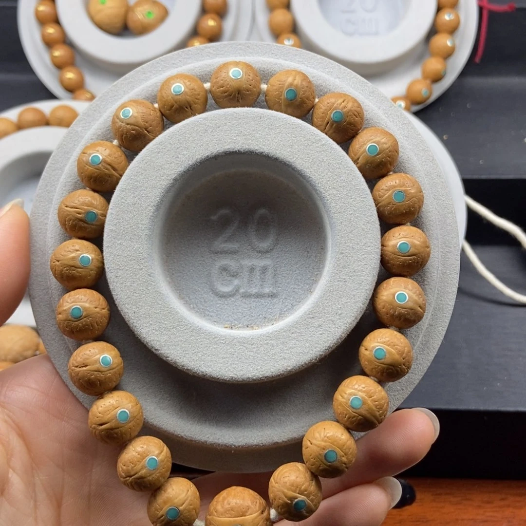 于***哈手串凤眼菩提12➕松