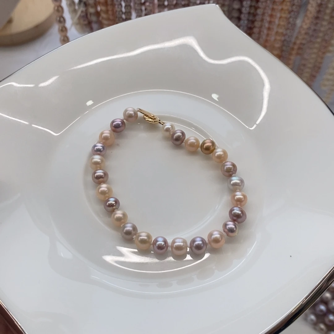 手绳合金淡水珍珠5-6不圆微瑕中等品质