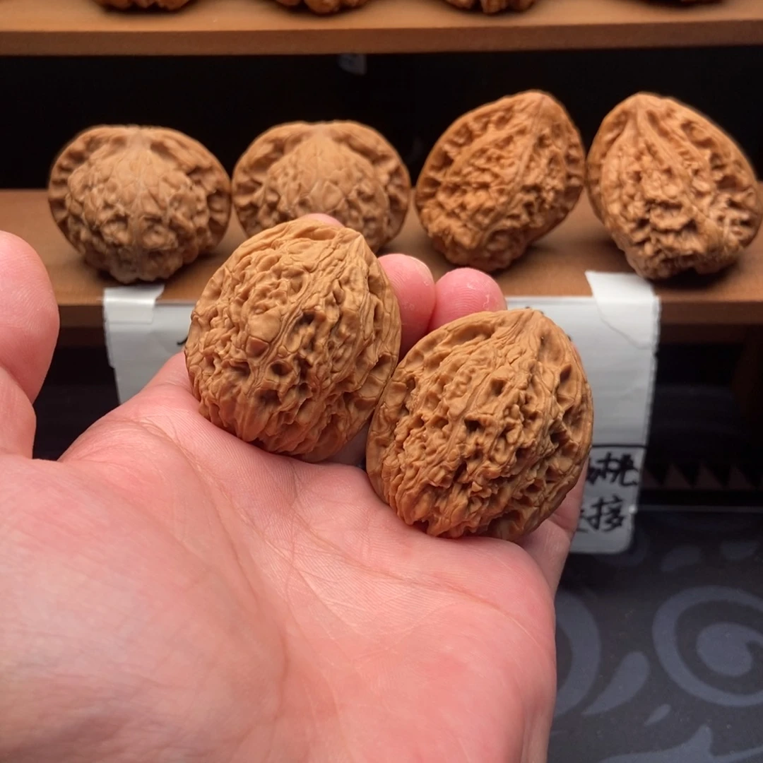 文玩核桃把件高炮南疆石(37尺寸)