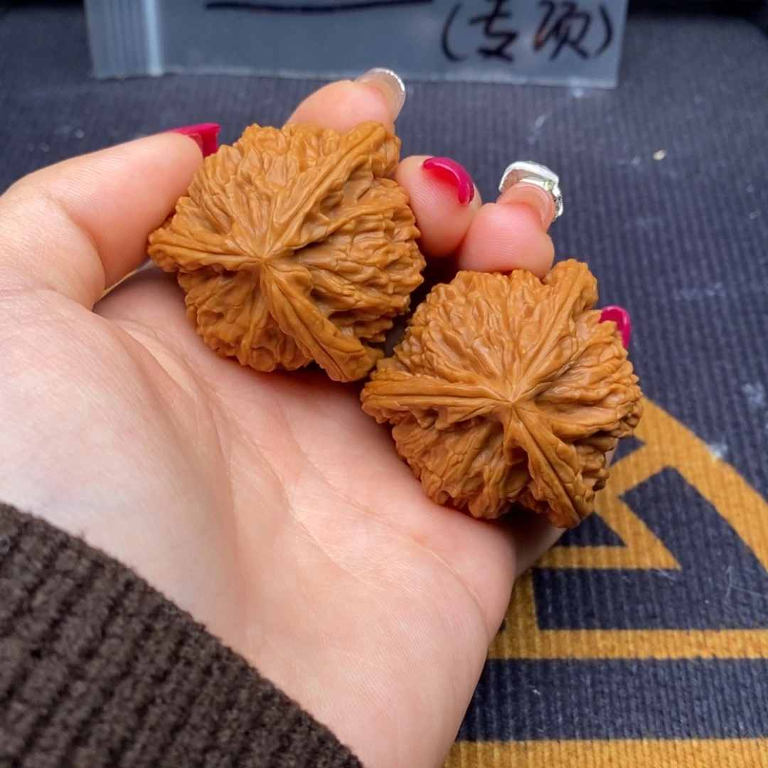 儿***他把件文玩核桃白狮子