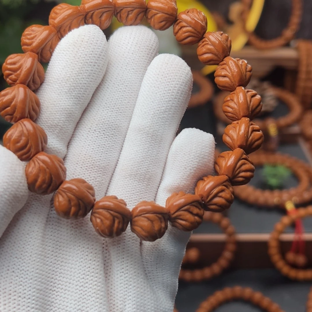 吊坠桃核拿**露1.4顶货双脊龙手串