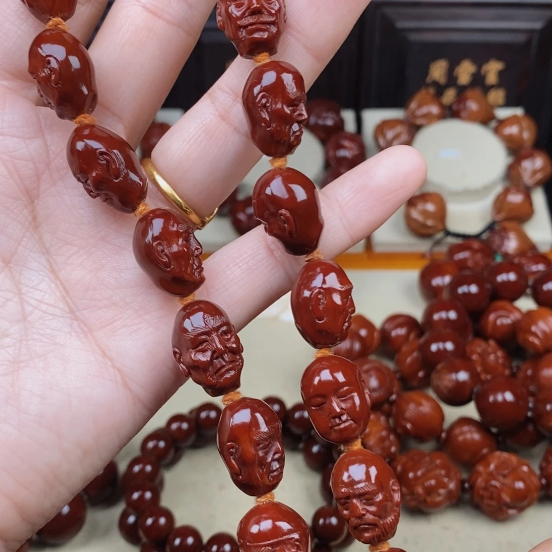 怎***雨橄榄核吊坠十八罗汉