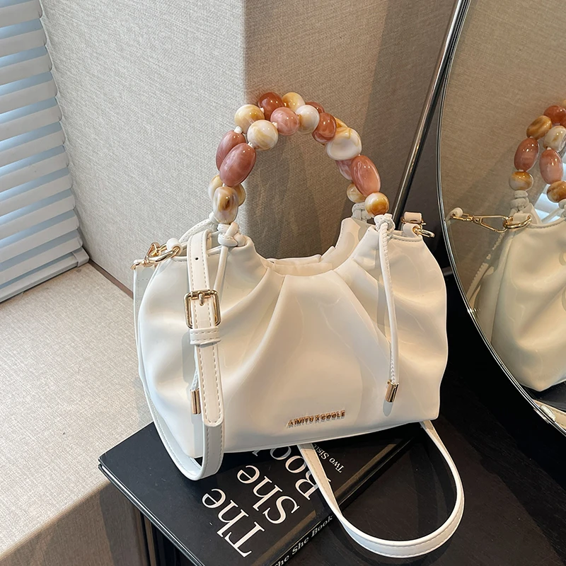Aimitu2025新款潮流时尚通勤简约串珠小众设计百搭手提斜挎包