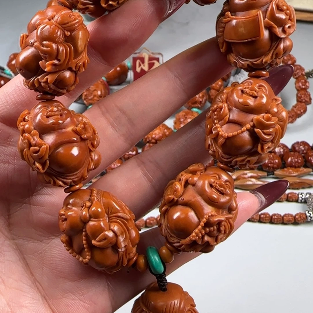 橄榄核手串/手链宽2.4鸡血红水晶核深雕八宝弥勒