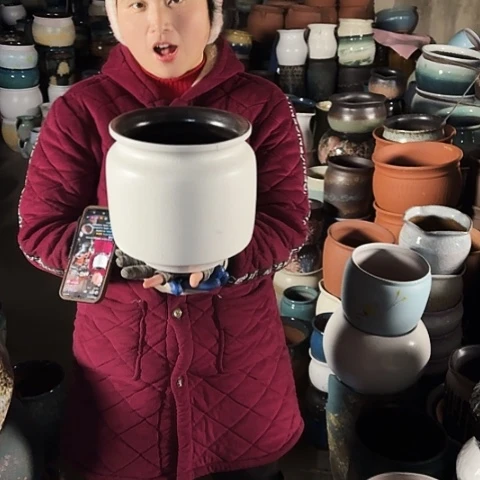 口21高22瑕疵盆子。