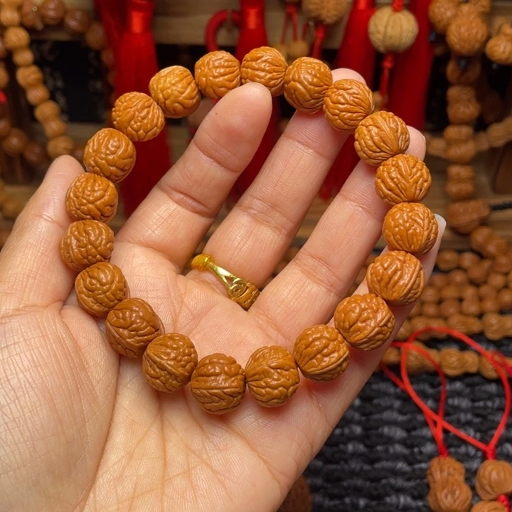 峰***转菩提籽类龙纹桃枭挂件