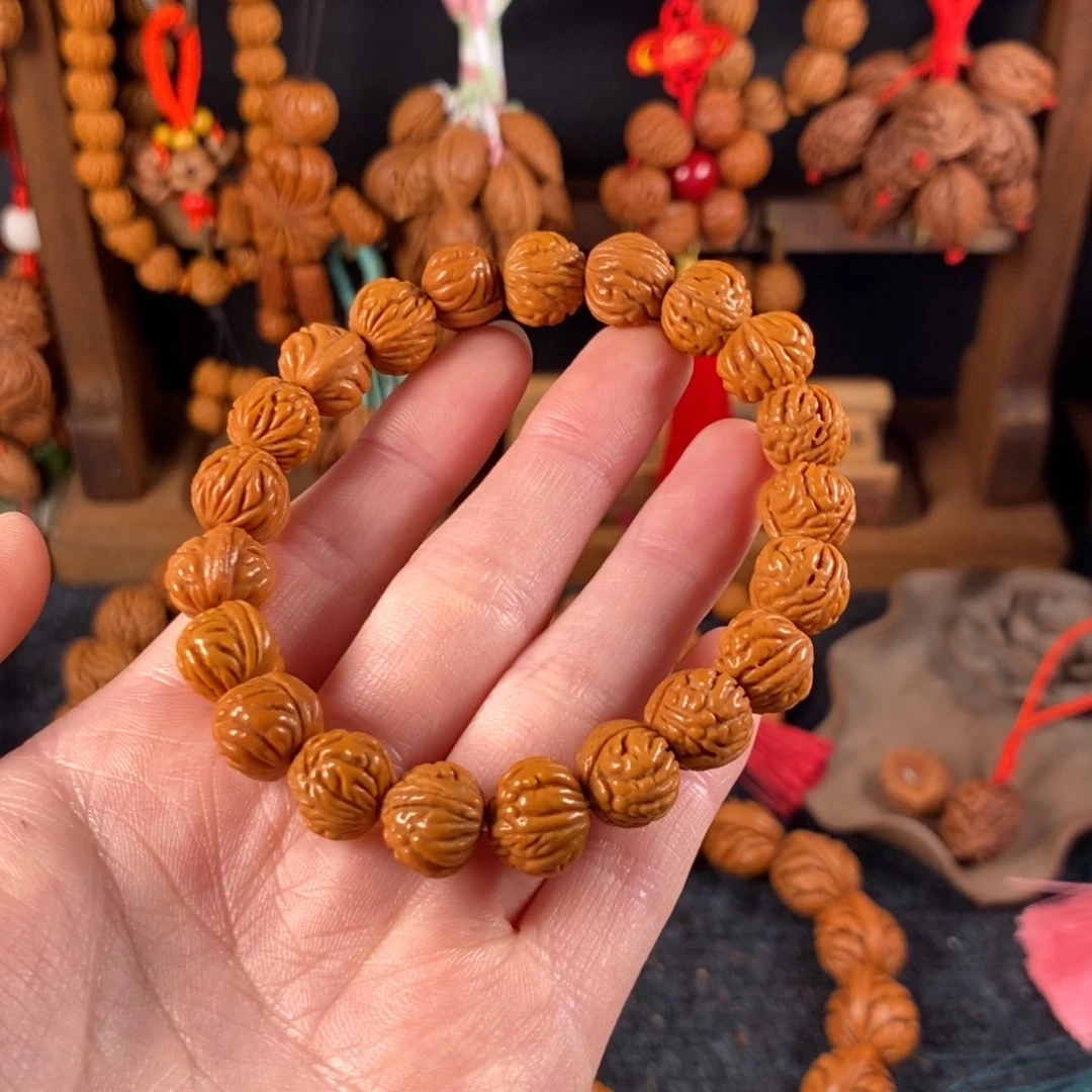 吊坠桃核桃枭手串