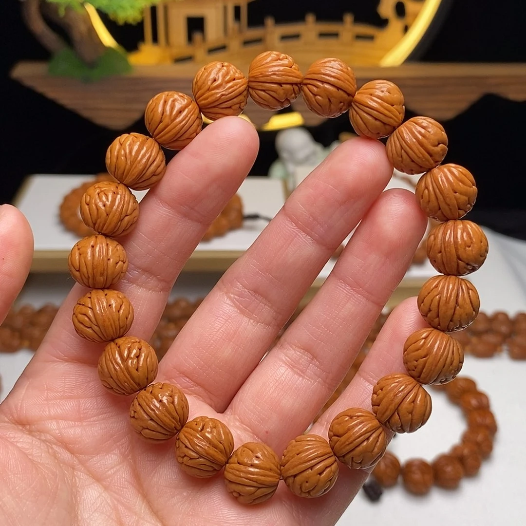 桃核手串12mm野生金麒麟桃核手串