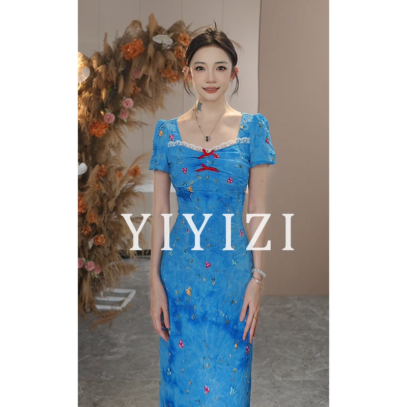依依子【画报夫人】蓝色刺绣连衣裙女夏长裙2025新款蝴蝶结裙子潮