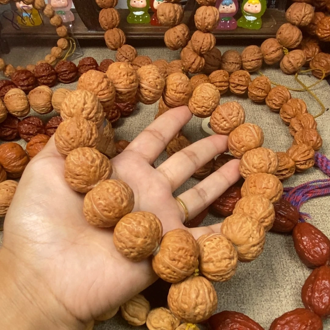 木***子吊坠文玩核桃元宝磨盘文玩核桃