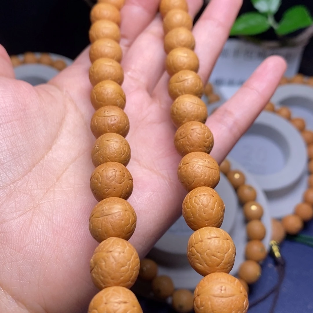 凤眼菩提吊坠12.5手持