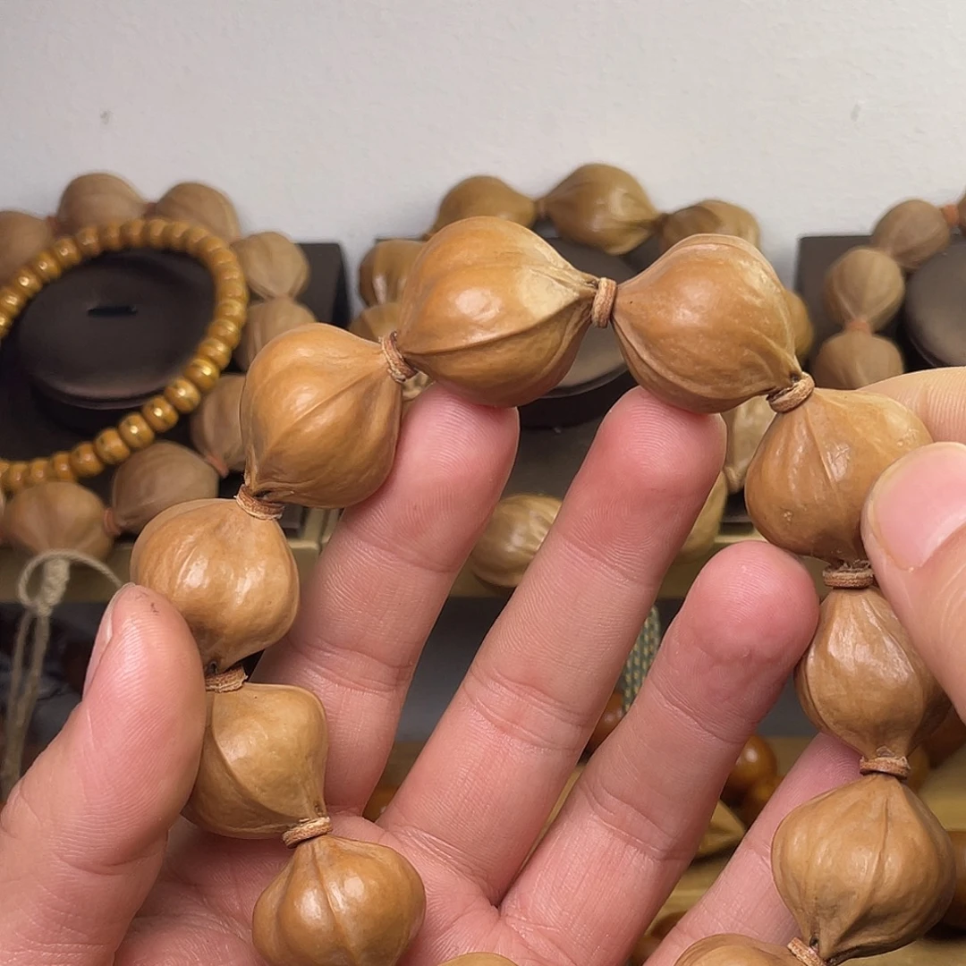 李***板手串/手链橄榄核2325四花