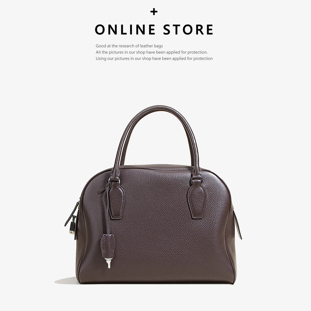 秋冬新款手提TR保龄球包简约通勤软皮手拎包大容量手腕真皮托特包