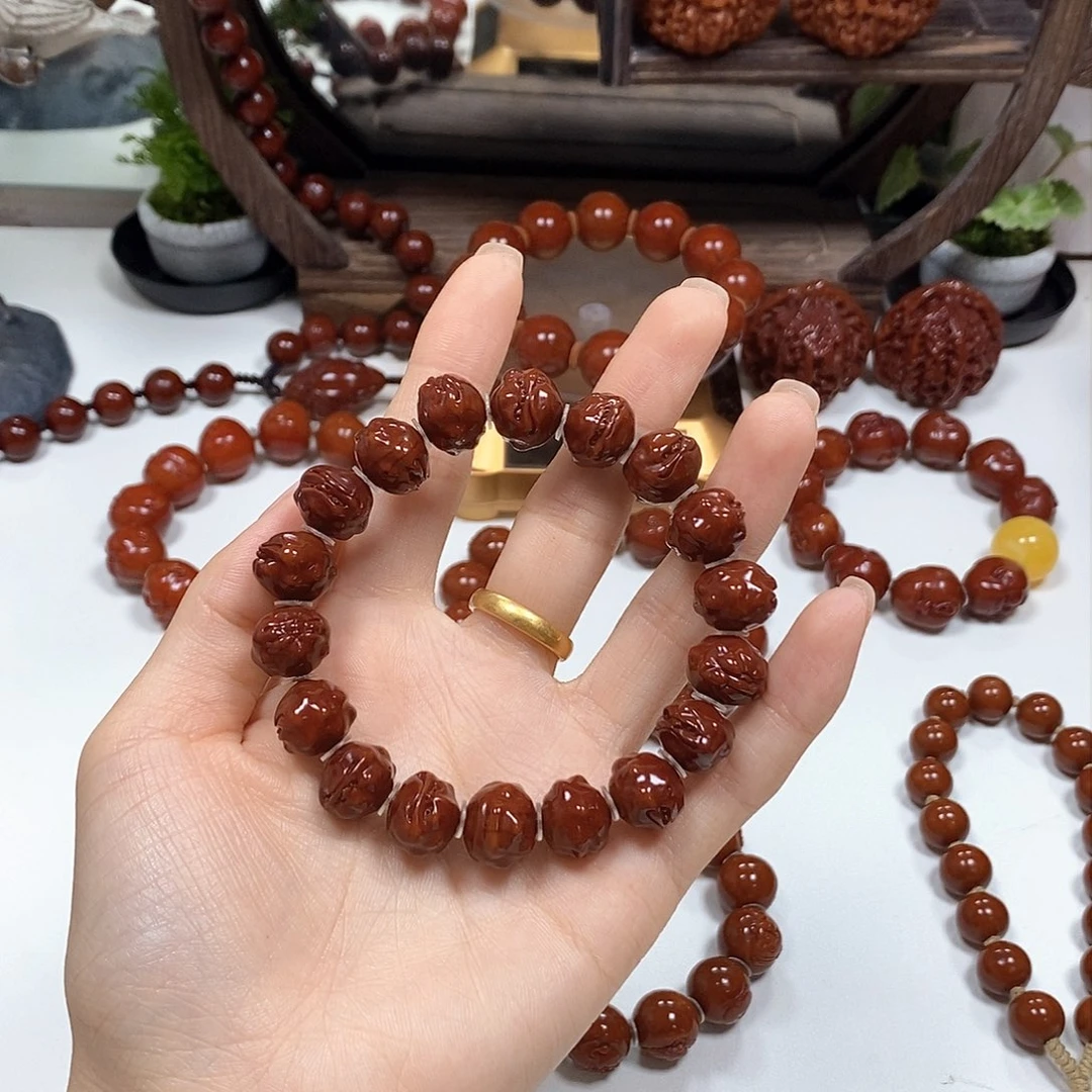 橄榄核把件浩****化蛙趣手串