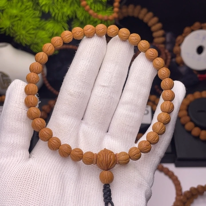 藏***锋桃核吊坠野生精品玉龙脊0.8