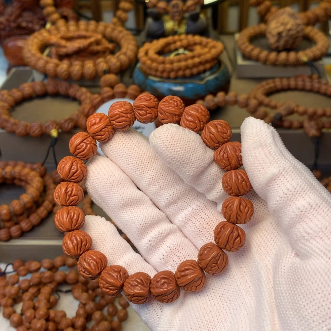 嘿***手串桃核秦岭龙纹