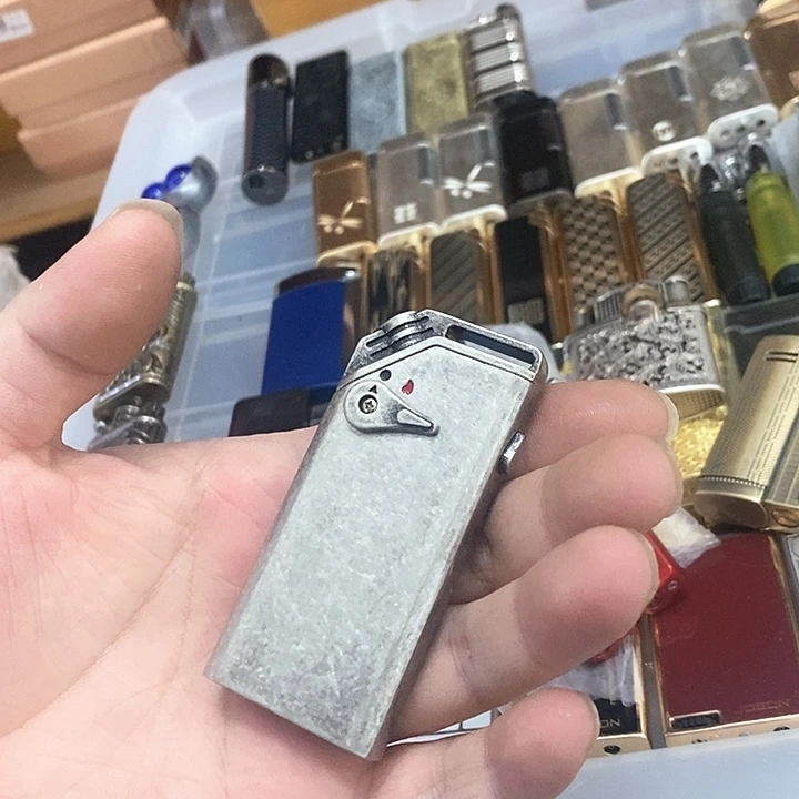 茉***开明铬充气感应双火打火机