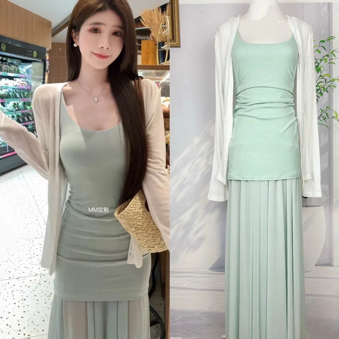 钓系都市2025新款早春法式气质修身收腰初恋绿色吊带裙开衫套装