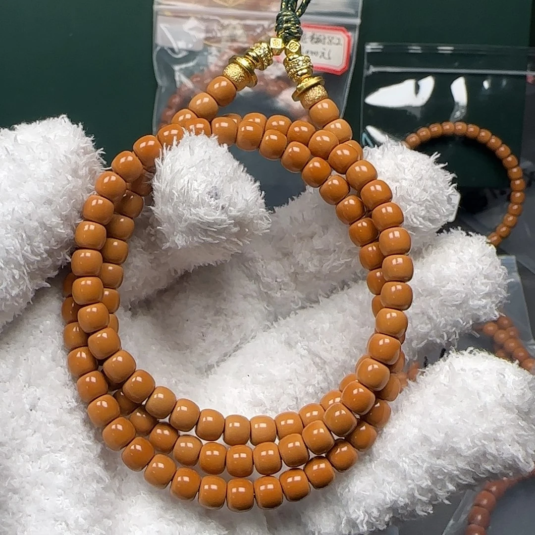 吊坠橄榄核6.1mm老挝全无白核尖长串毕业级