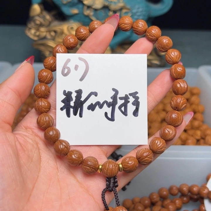 桃核把件秦岭野生龙纹桃核玉龙脊