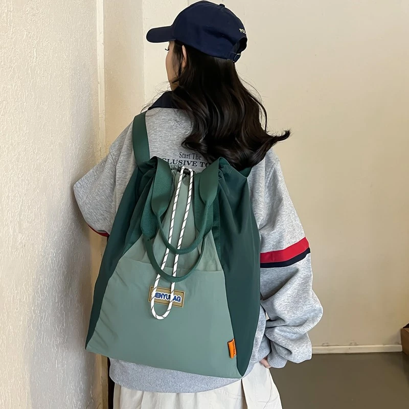 轻便抽绳多功能双肩包新款大容量户外旅行背包简约运动休闲书包女