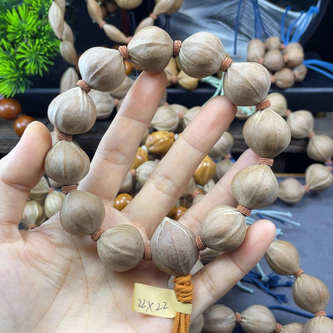 茗***哥橄榄核吊坠005.22x22