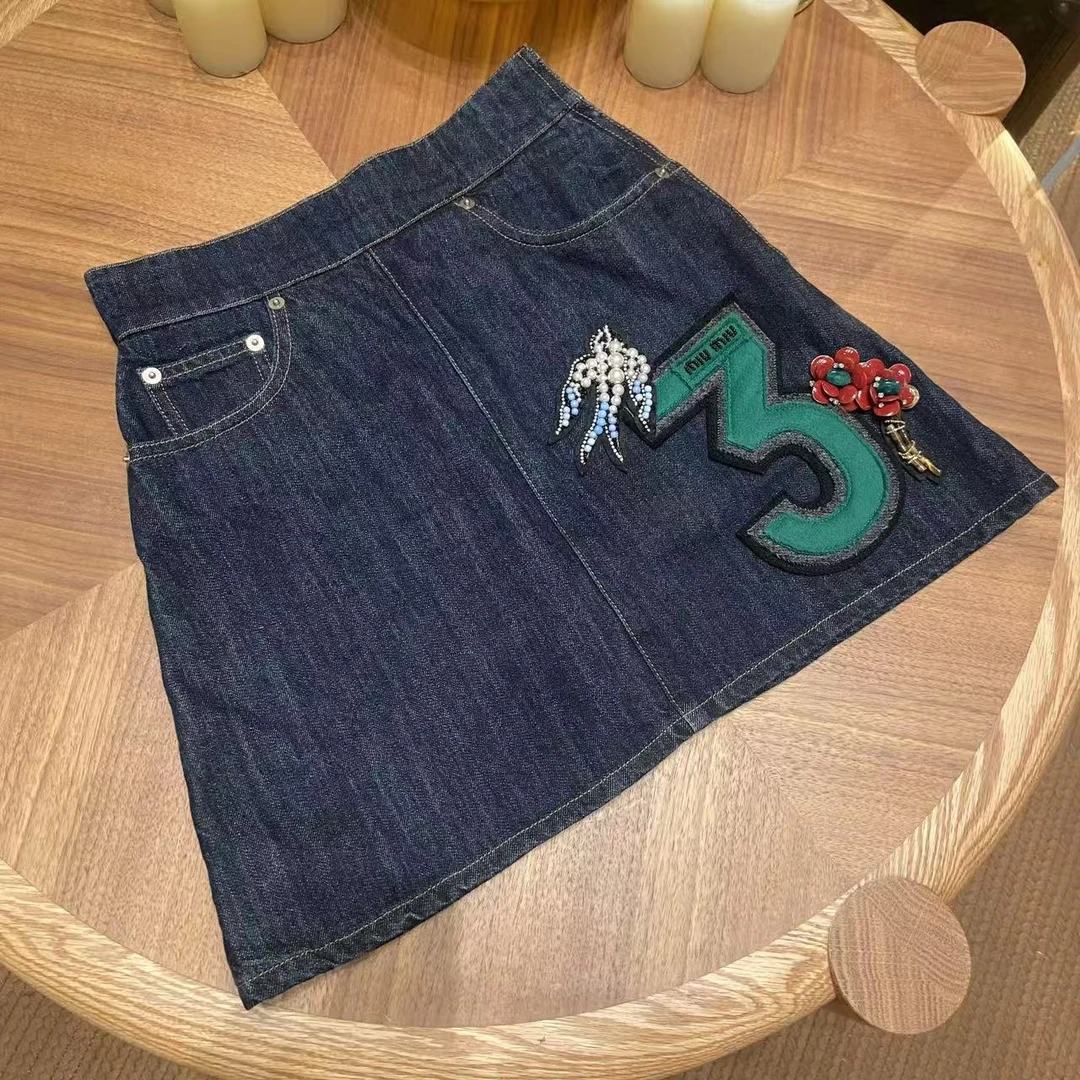 99新 MIU MIU/缪缪 su/珍珠牛仔短裙/85198112/12期/代卖服务