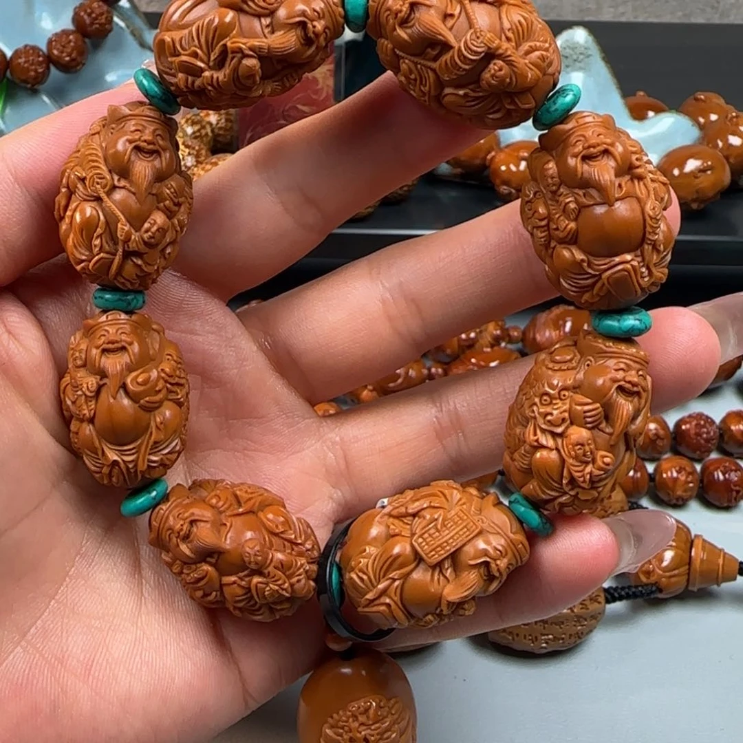 橄榄核手串双童子骑兽财神