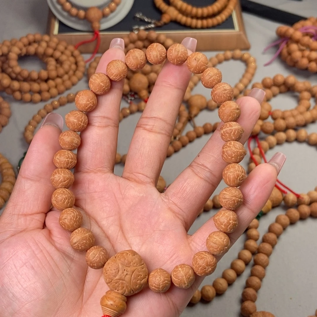 凤眼菩提吊坠尼泊尔凤眼实心手持27颗10.6-10.7