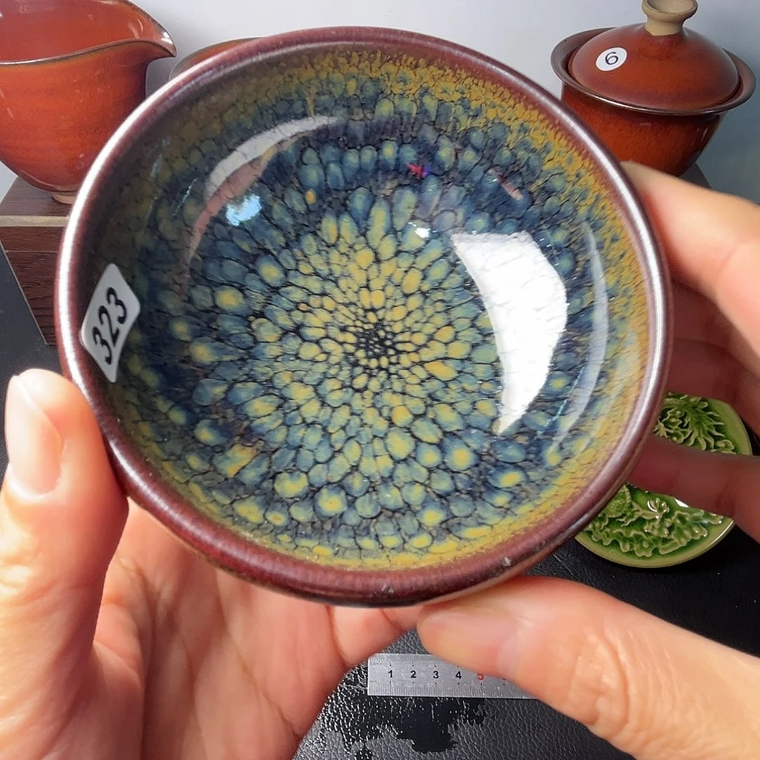 茶盏我不敢接他打电话我说