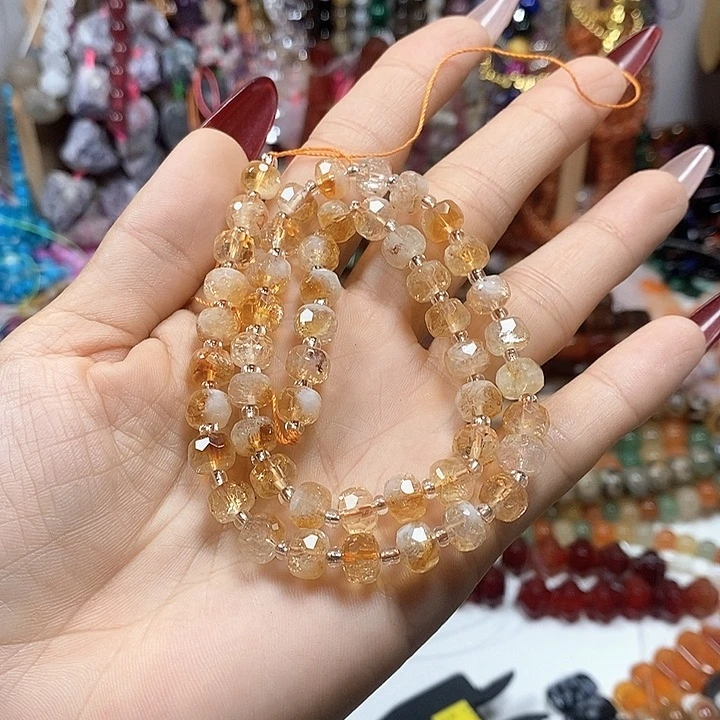 玛瑙/玉髓未镶嵌珠宝半成品天然黄塔晶切面车轮卡7.5mm