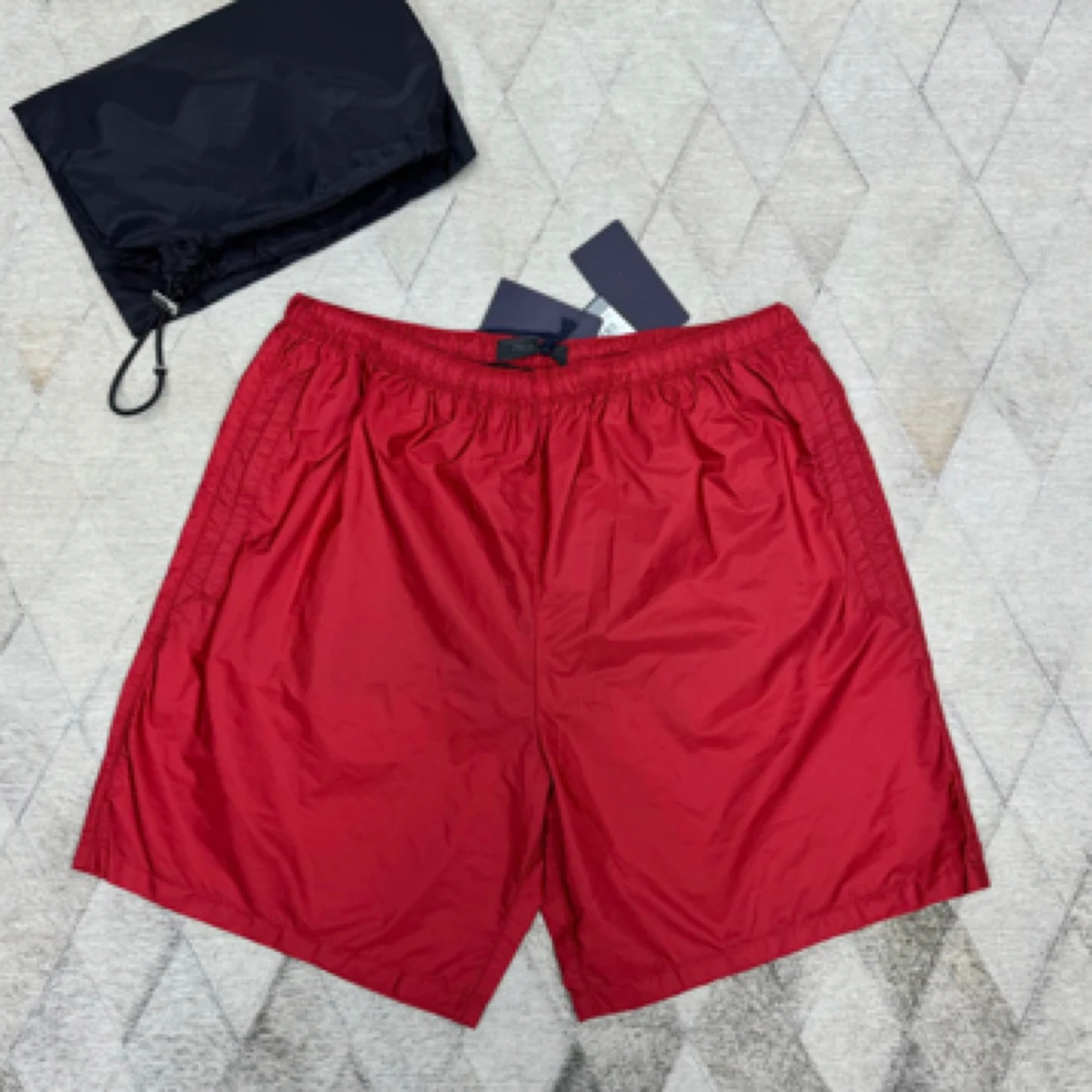 未使用 Prada/普拉达 133566 男款尼龙短裤 经典三角标