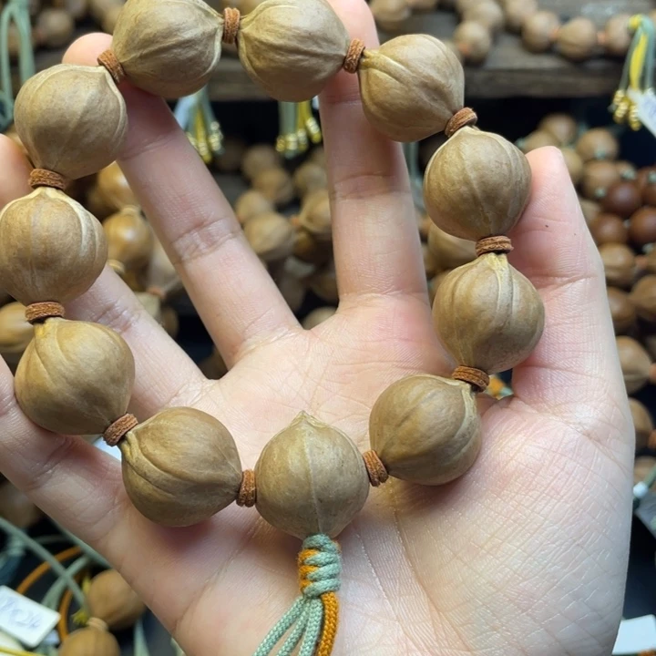 冷***风橄榄核手串/手链001.215×25