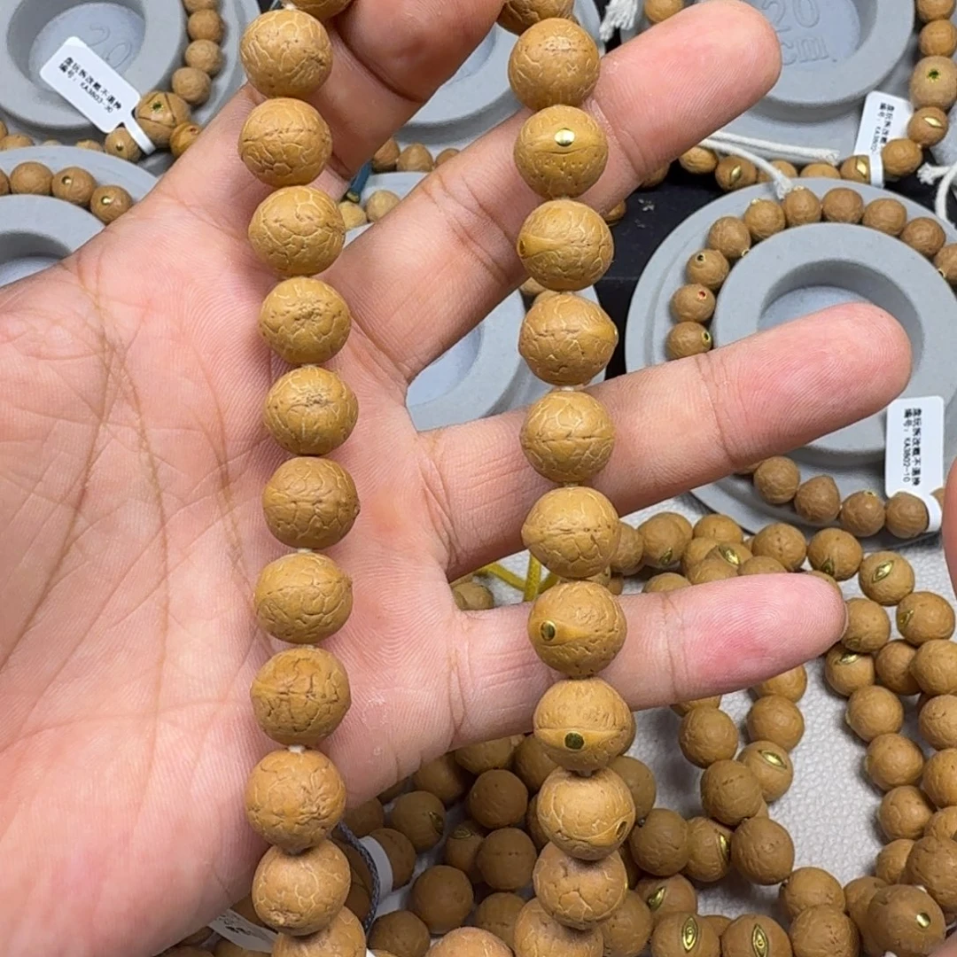 凤眼菩提吊坠12小mm凤眼手持铜钉