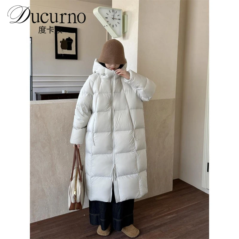2025冬季新款女士时尚通勤宽松过膝长款鸭羽绒服中长款百搭设计外