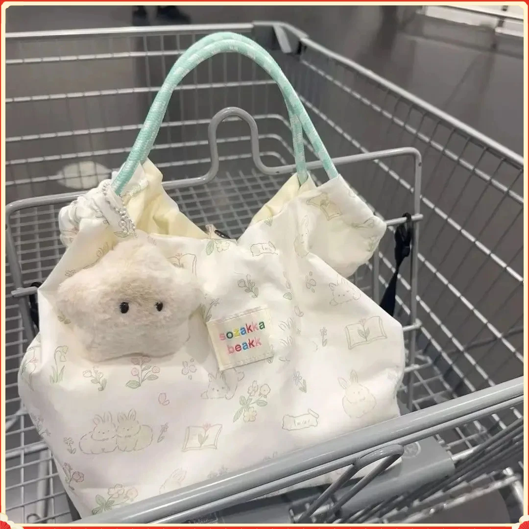 可爱碎花小白兔帆布包大容量DMB百搭手拎布袋休闲时尚抽绳【飞菲】