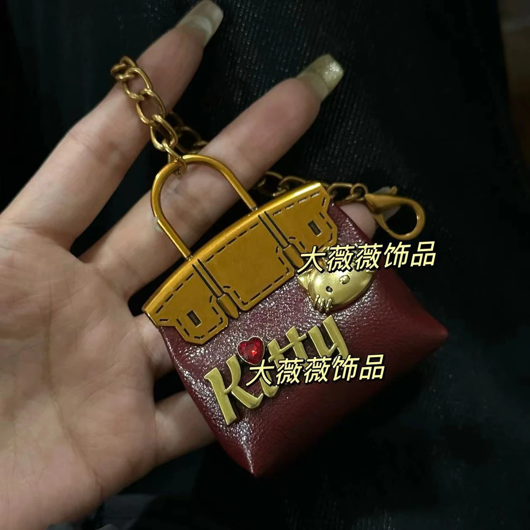 酒红色包包造型包挂件-38191