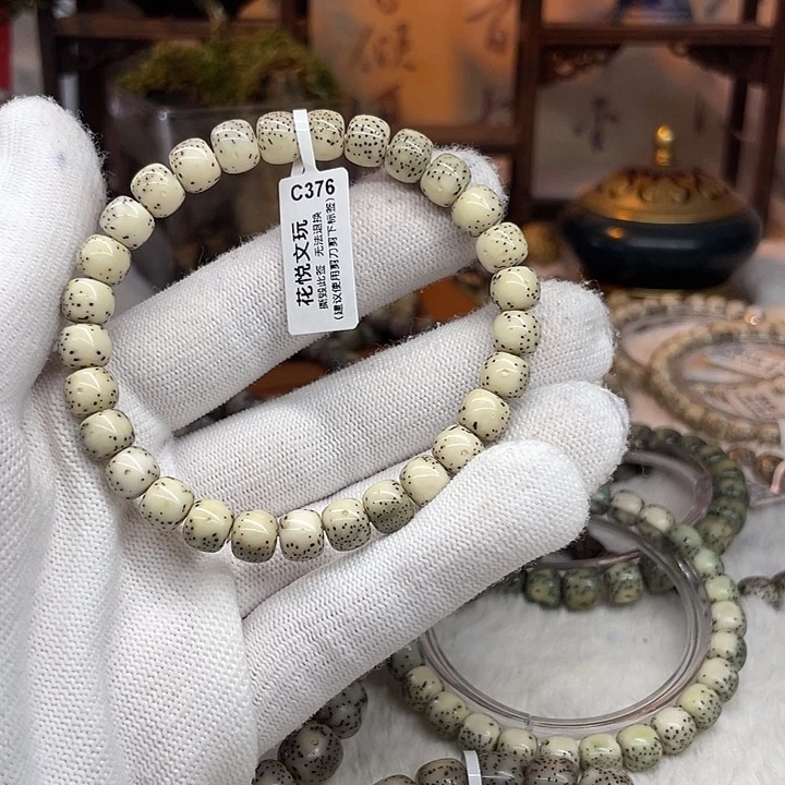 星月菩提手串潦**昭灰贝河豚月留白