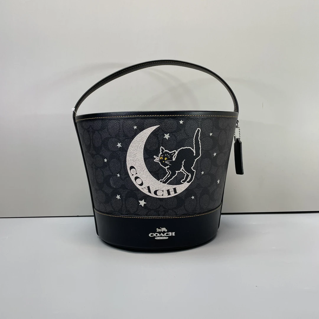 99新 COACH/蔻驰 小林/猫咪星空黑老花水桶包20*19*7cmB021517