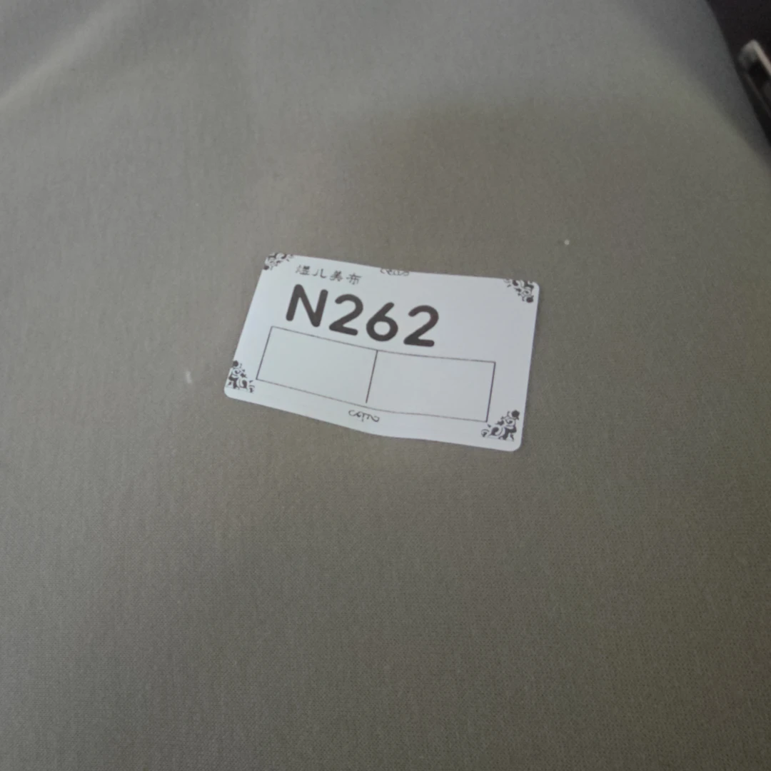 262灰绿色一体颗粒绒布料