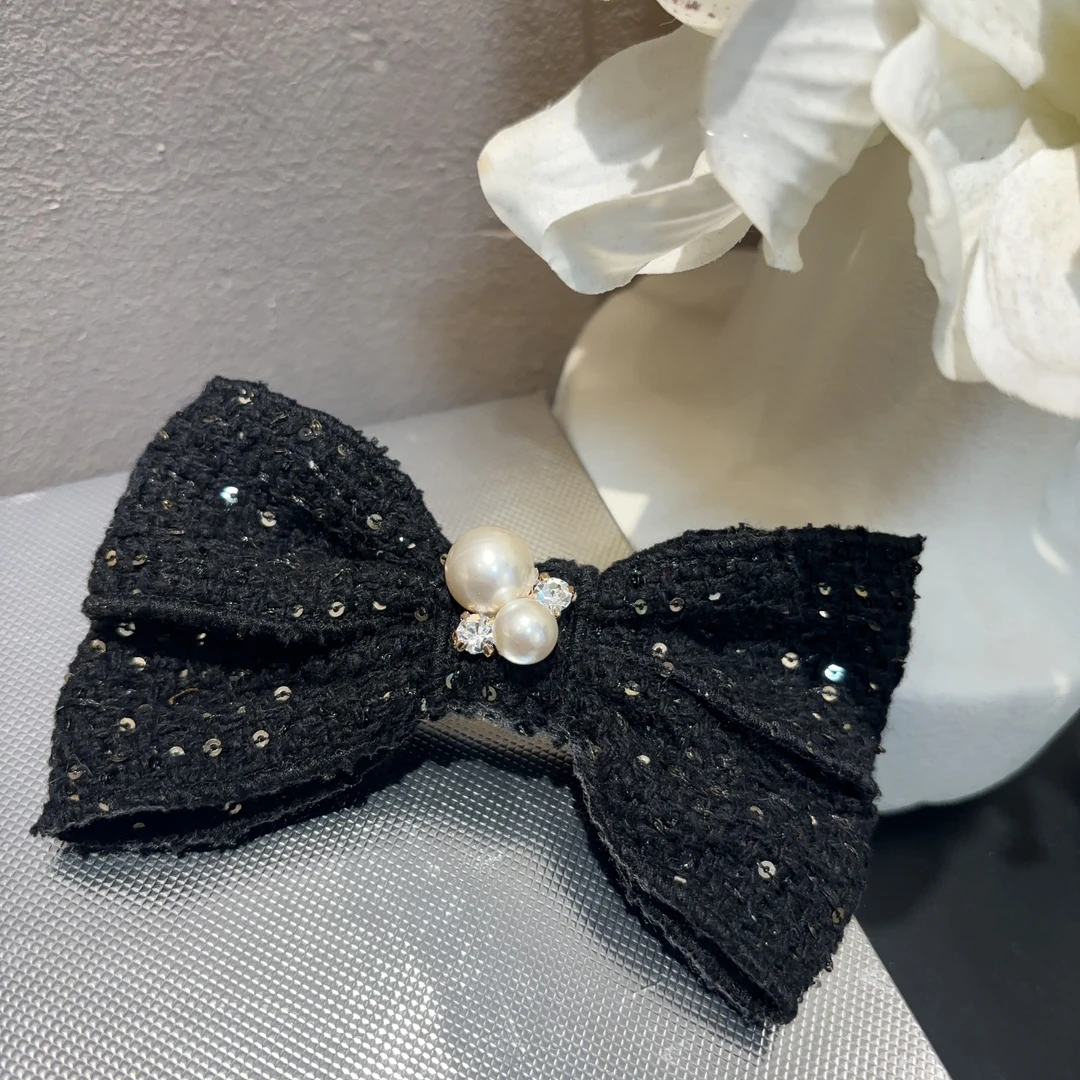 设计款亮片蝴蝶结珠珠弹簧夹Y1000