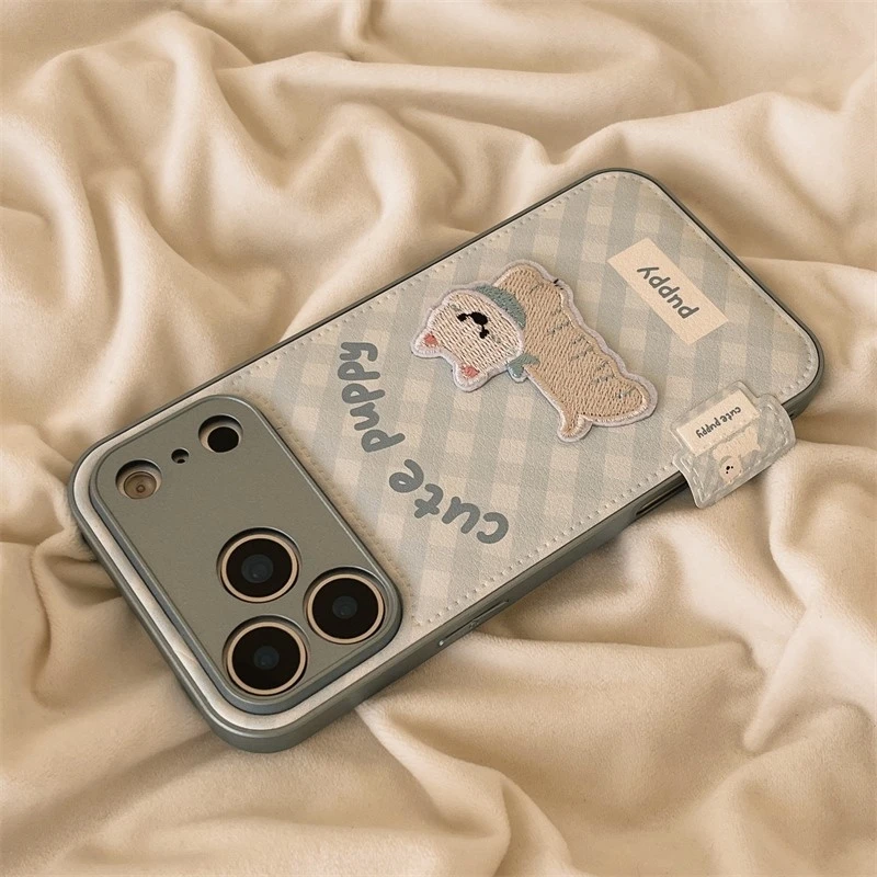 刺绣小狗适用苹果17ProMax金属皮纹气垫手机壳华为oppovivo小米